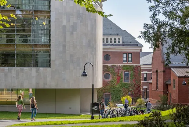 Students walking in front of Neilson Library.